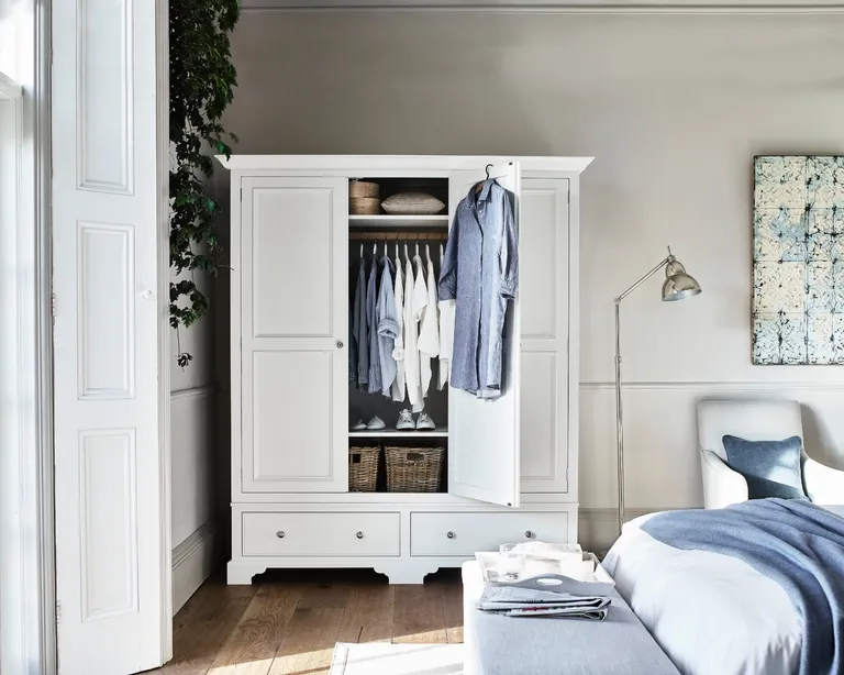 Bespoke walk-in closet with full-wall custom shelving and shoe racks in Johannesburg, Gauteng by Elite Wood Works