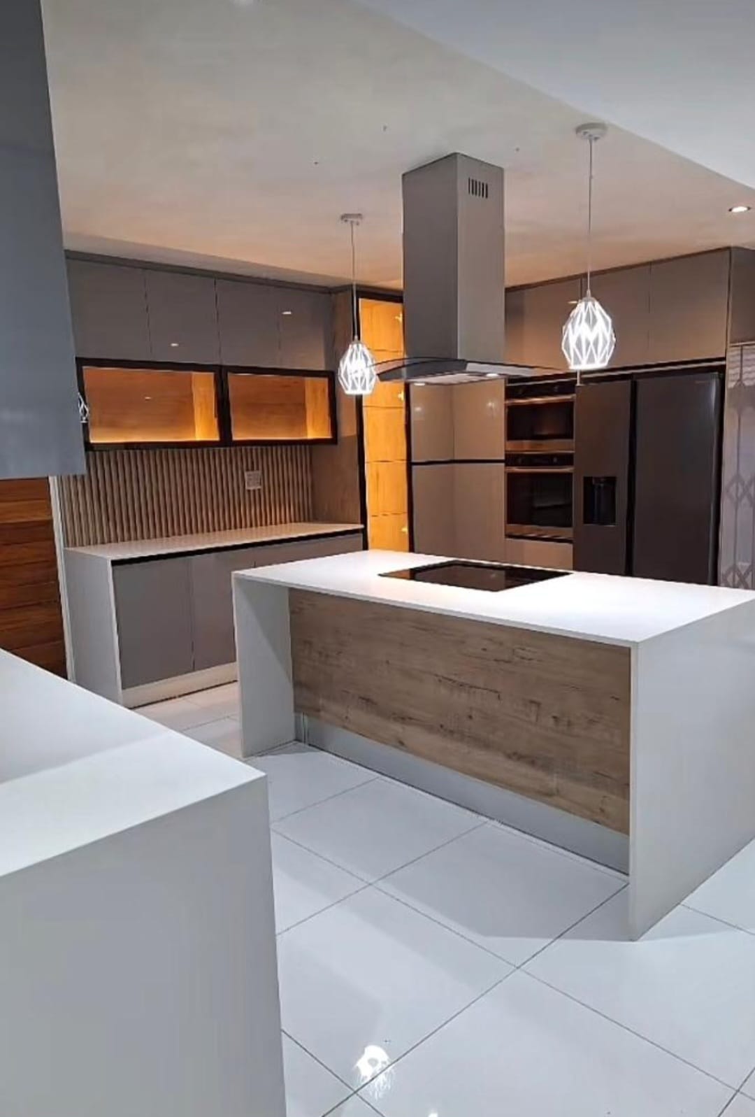 Modern minimalist charcoal and marble custom kitchen cabinets in Bedfordview, Ekurhuleni by Elite Wood Works